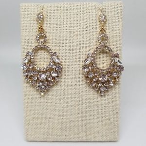 Gold tone crystal earrings small clear stones
